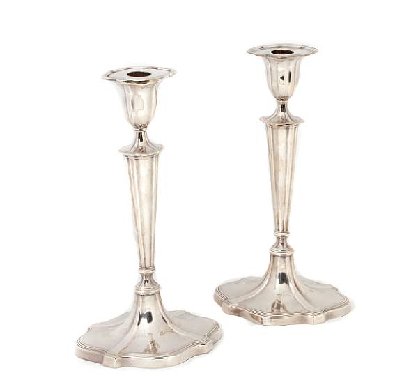 Appraisal: A set of four Victorian silverplate candlesticks height in