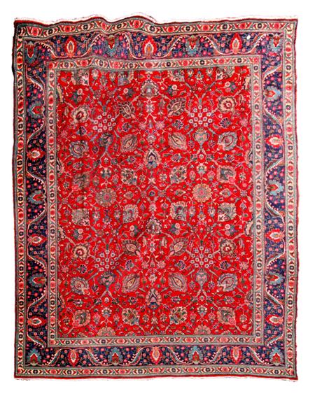 Appraisal: A late Tabriz carpet the red field with a symmetrical