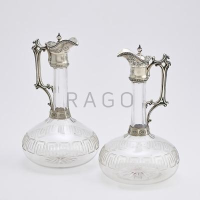 Appraisal: PAIR OF SILVER MOUNTED CUT GLASS CLARET JUGS Bulbous bodies