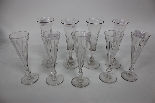 Appraisal: A SET OF FOUR CHAMPAGNE FLUTES together with a set