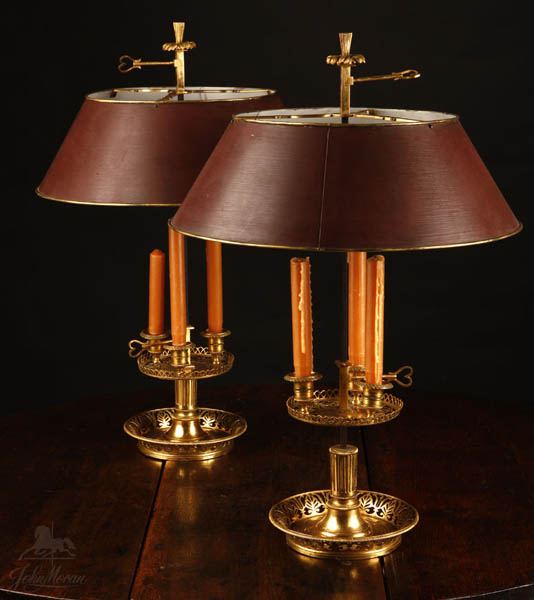 Appraisal: A pair of Empire style bronze bouillotte lamps A pair