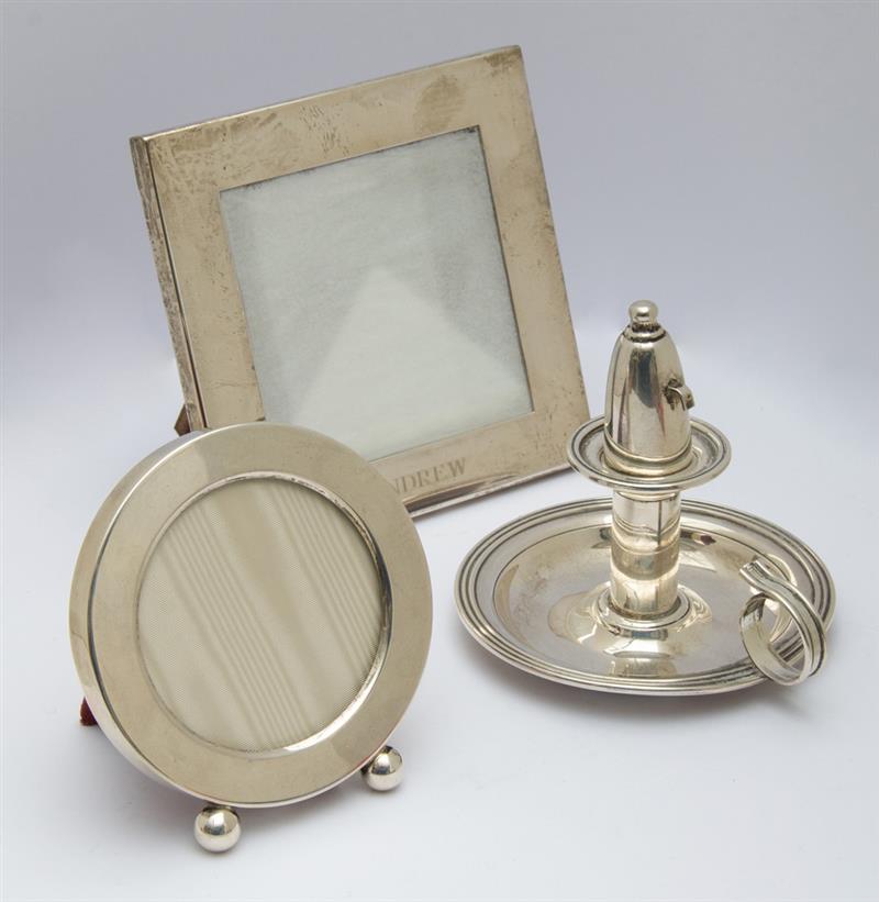 Appraisal: TWO SMALL SILVER PICTURE FRAMES AND A CIGARETTE LIGHTER WITH