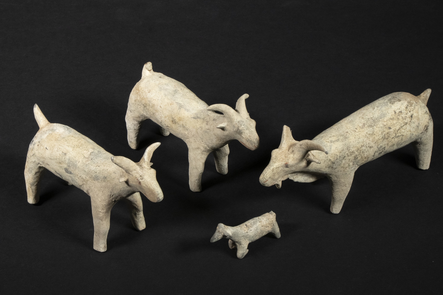 Appraisal: CHINESE HAN BURIAL OFFERINGS OF GOATS A Han Family Group