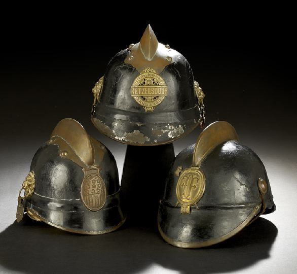 Appraisal: Trio of Austro-Bavarian Pre-WWI Steel Leather and Brass Fire Helmets