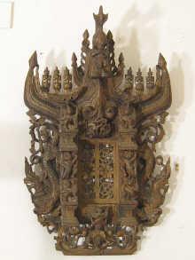 Appraisal: An oriental wood carving depicting dragons and figures carved from