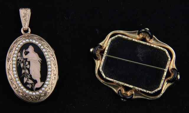 Appraisal: An oval locket centred by an enamel vignette of a