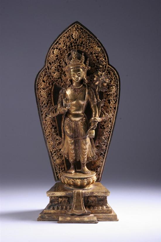 Appraisal: SINO-TIBETAN GILT BRONZE DEITY Standing on stepped base with ornate