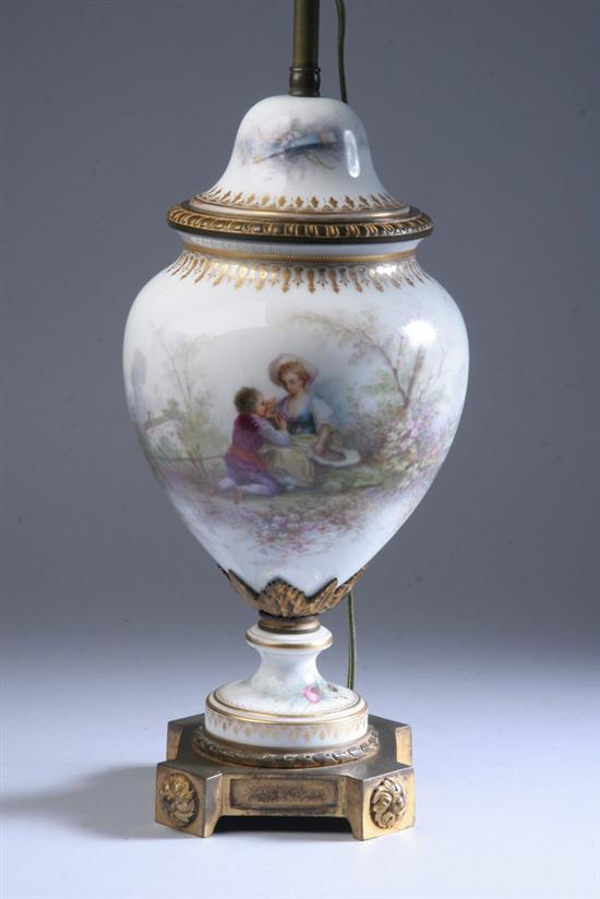 Appraisal: S VRES-STYLE PORCELAIN VASE AND COVER circa Painted with young