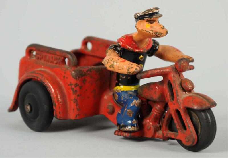 Appraisal: Cast Iron Hubley Popeye Spinach Motorcycle Toy American Three-wheel cycle