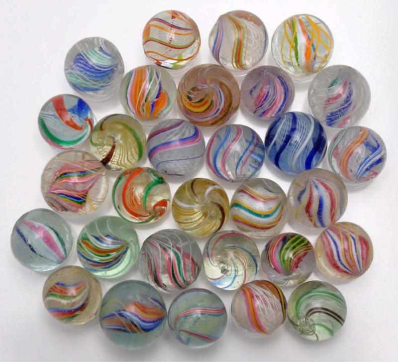 Appraisal: Lot of Swirl Marbles Description Includes white and yellow latticino