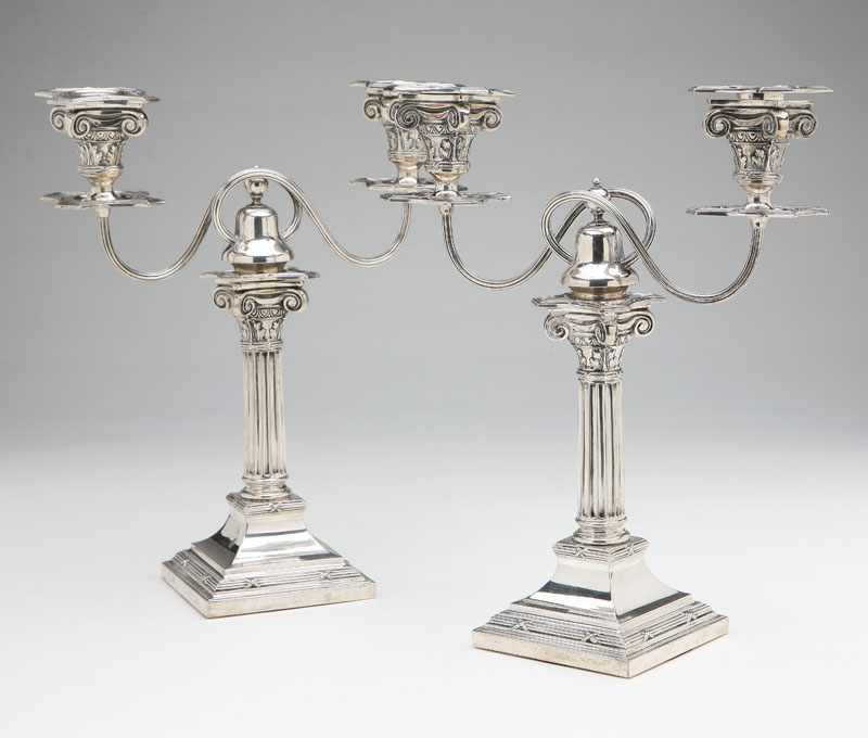 Appraisal: A pair of German silver neoclassic style two-light candelabra Korner