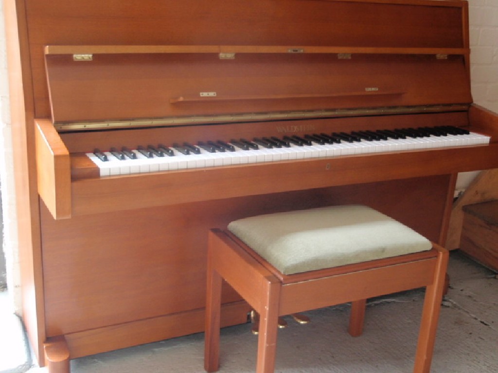 Appraisal: A Waldstein upright piano and piano stool