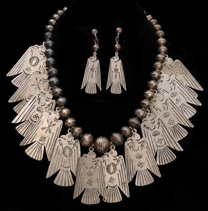 Appraisal: NAVAJO SQUASH BLOSSOM NECKLACE WITH THUNDER BIRDS AND MATCHING EARRINGS