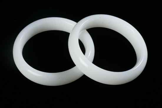 Appraisal: PAIR CHINESE WHITE JADE BANGLES - in diam