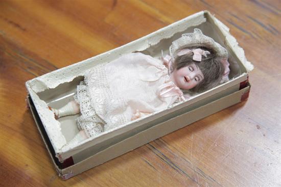 Appraisal: SMALL GERMAN DOLL Bisque head sleep eyes and open mouth