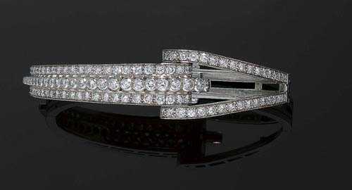 Appraisal: BRILLIANT-CUT DIAMOND BANGLE ca White gold Elegant bangle the top