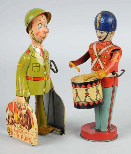 Appraisal: Lot of Tin Character Wind-Up Toys Description American Working Includes