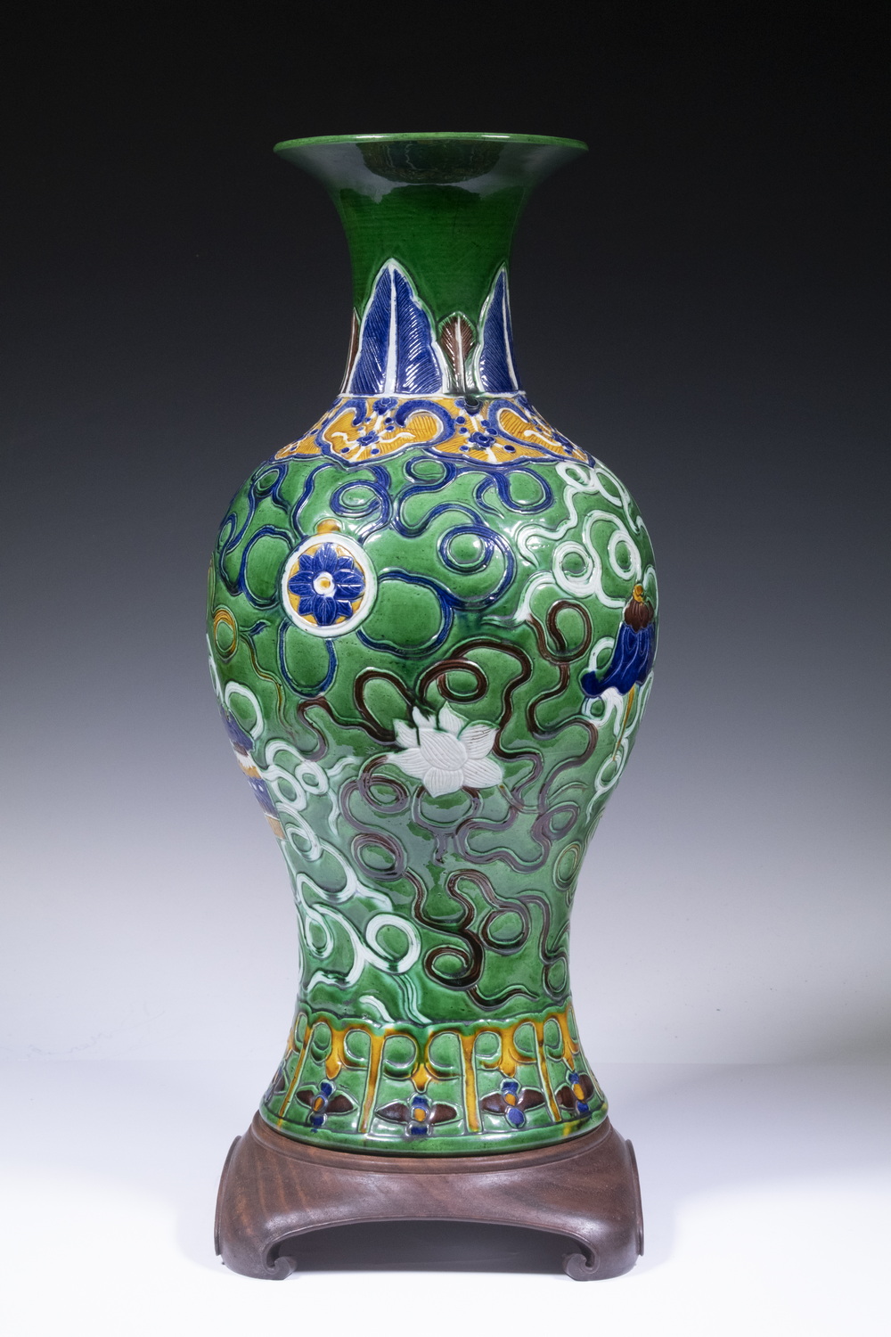 Appraisal: CHINESE FAHUA SANCAI GLAZE VASE Baluster Form Porcelain Vase with