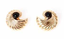 Appraisal: A pair of ct gold black stone set nautilus shaped