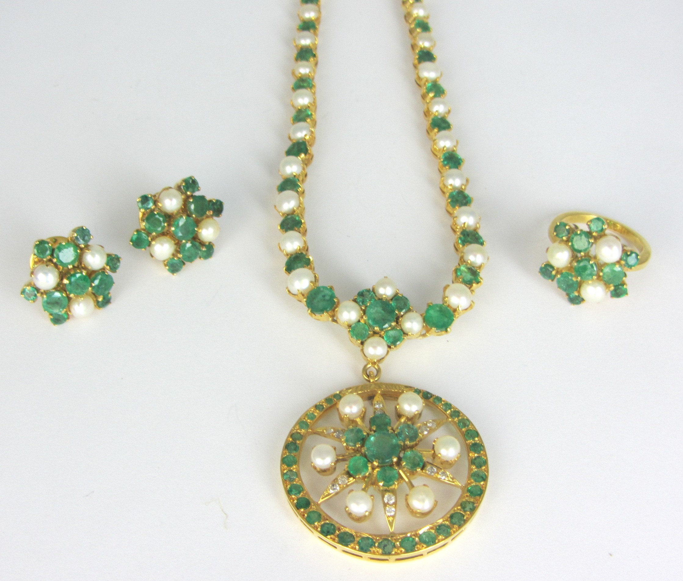 Appraisal: An Indian gold emerald cultured pearl and diamond set demi-parure