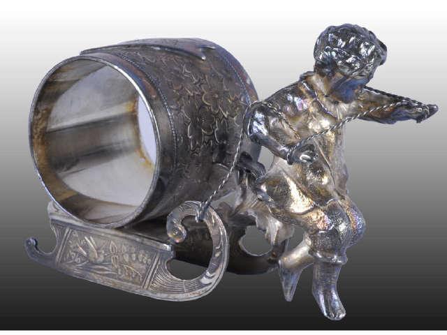 Appraisal: Boy Pulling Sled Figural Napkin Ring Description Marked Wilcox Condition