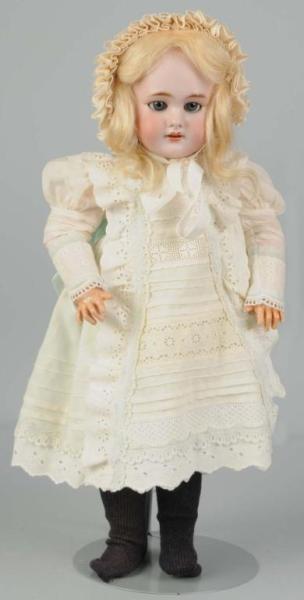 Appraisal: Jumeau Bebe Girl Doll Description Open mouth with blonde hair