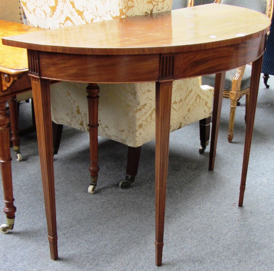 Appraisal: A George III design inlaid mahogany semi elliptic console table