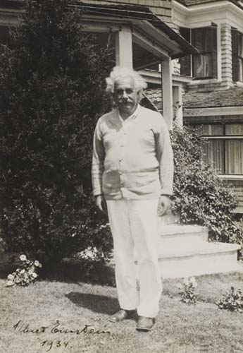 Appraisal: EINSTEIN ALBERT Photograph Signed image of Einstein standing before a