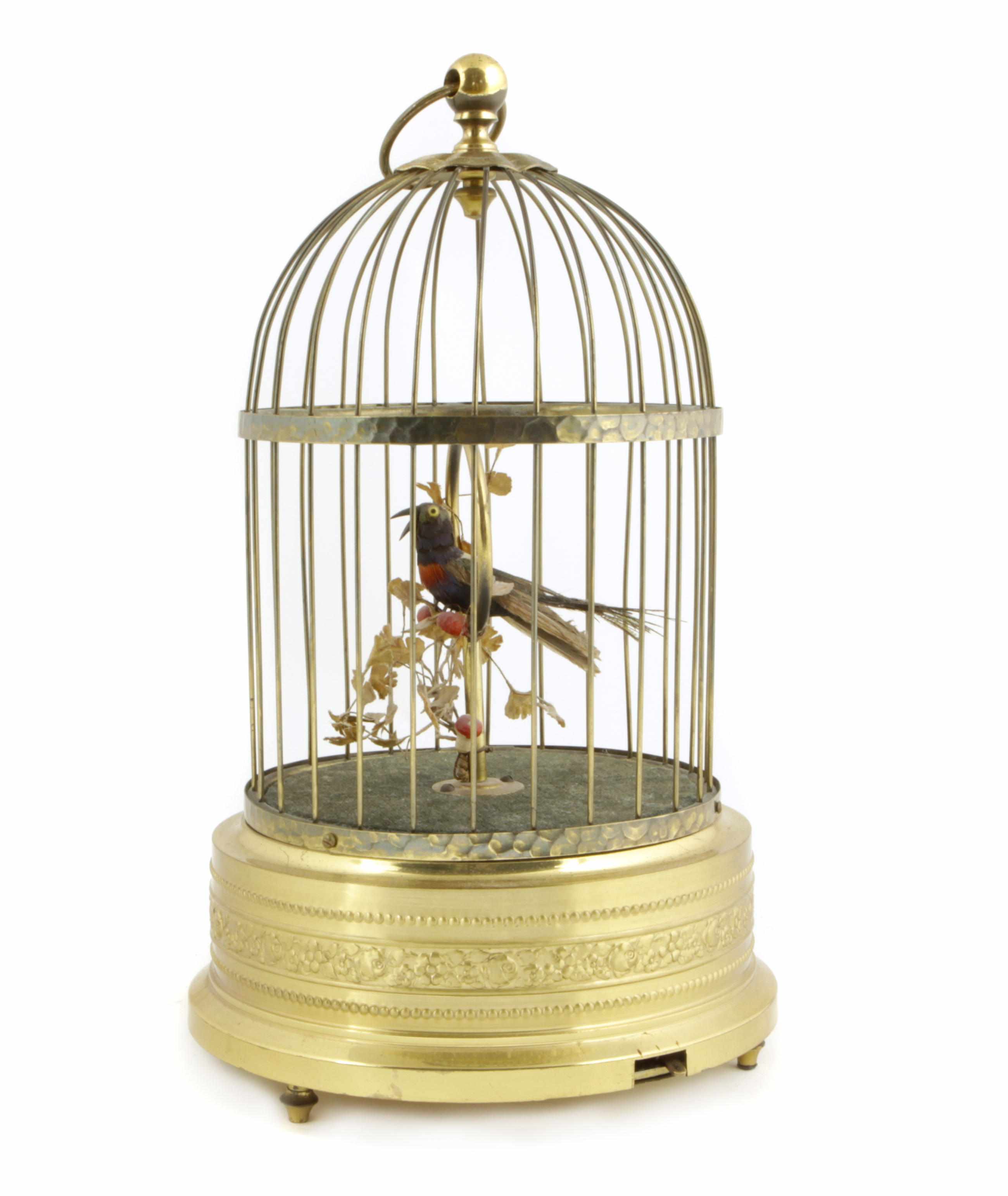 Appraisal: A French musical singing bird in a gilt metal cage