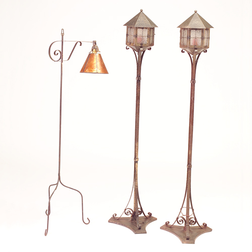 Appraisal: Three Arts Crafts floor lamps pair of copper patina lanterns