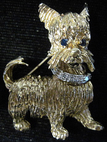 Appraisal: karat yellow gold diamond and sapphire 'dog' pinTerrier set with