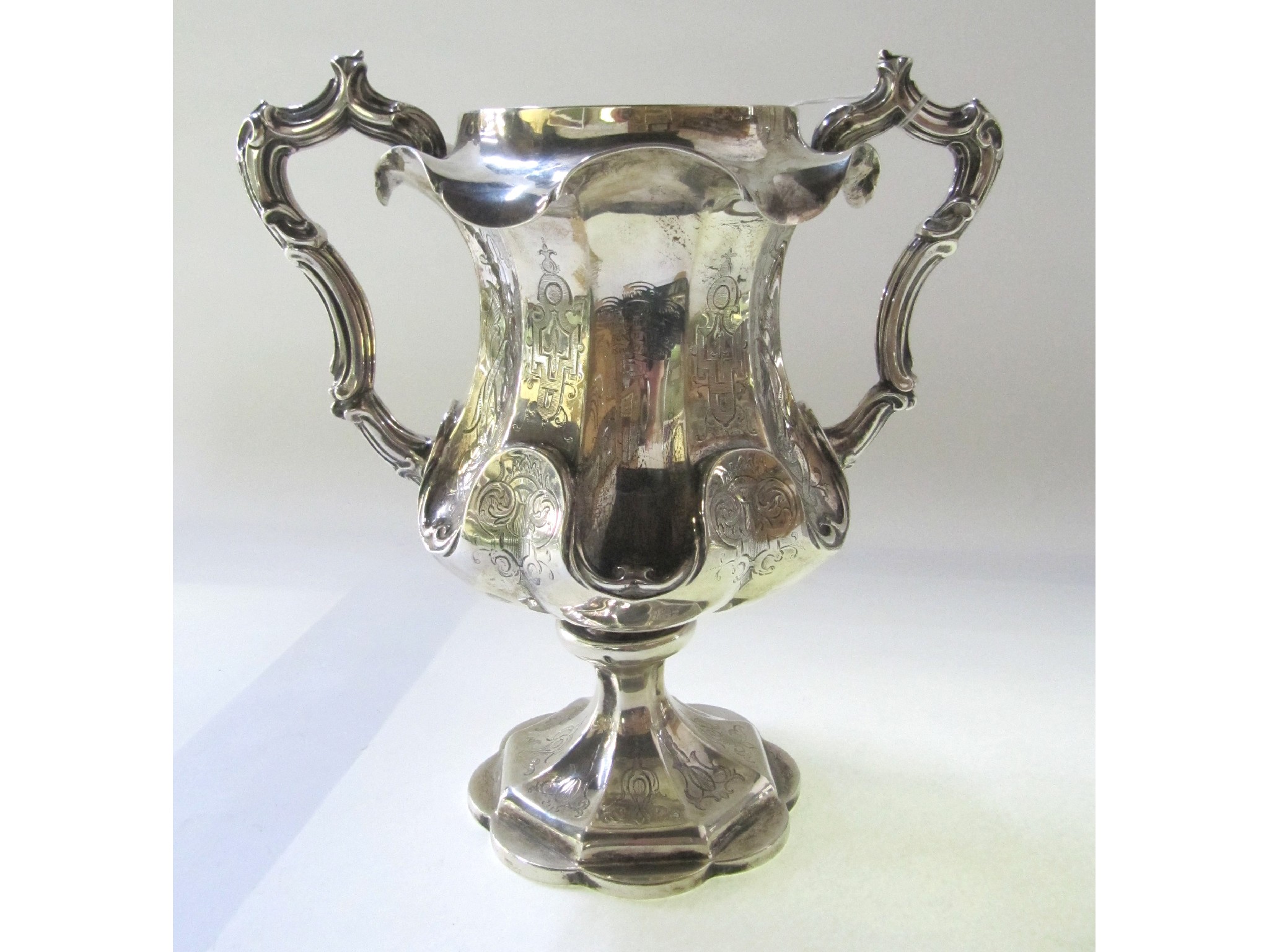 Appraisal: A Victorian silver double handled trophy cup London inscribed 'Presented