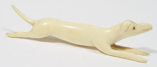 Appraisal: Carved ivory hunting dog cm in length