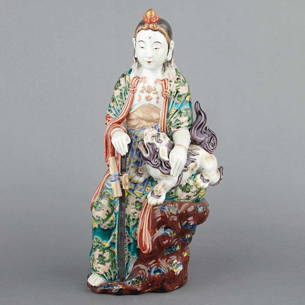 Appraisal: Japanese Glazed Porcelain Kannon Meiji Period Seated on rockwork a