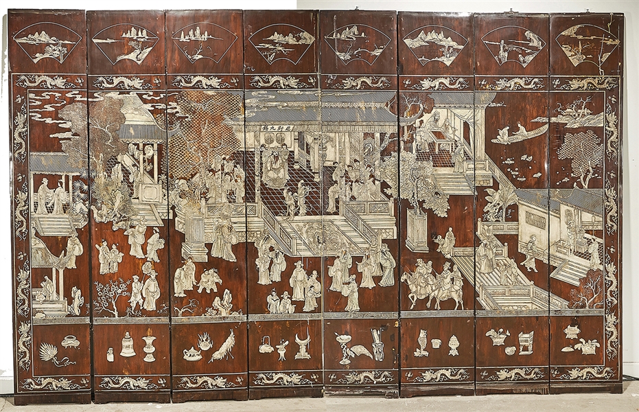 Appraisal: Chinese eight-panel wood screen with carved designs depicting numerous courtyard