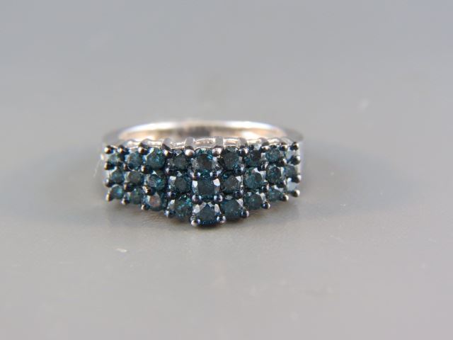 Appraisal: Blue Diamond Ring round brilliant diamonds totaling carats in sterling