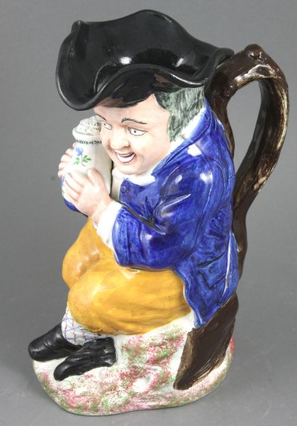 Appraisal: Early th Century English Staffordshire Toby jug h Good condition