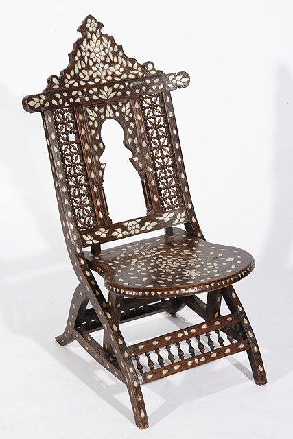 Appraisal: A SYRIAN INLAID LOW FOLDING CHAIR with inlaid mother-of-pearl leaf