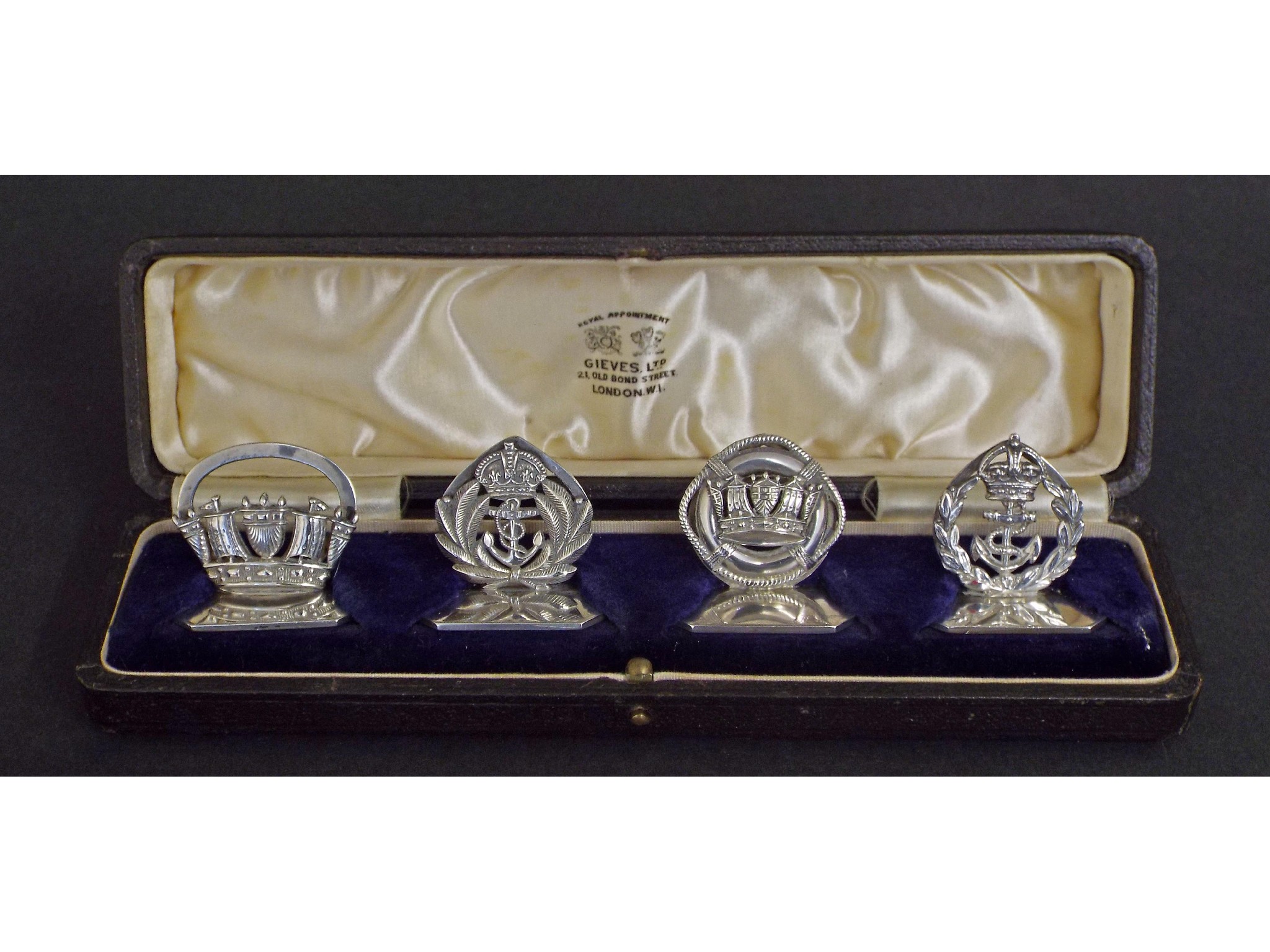 Appraisal: Cased set of four Gieves Limited silver menu holders all