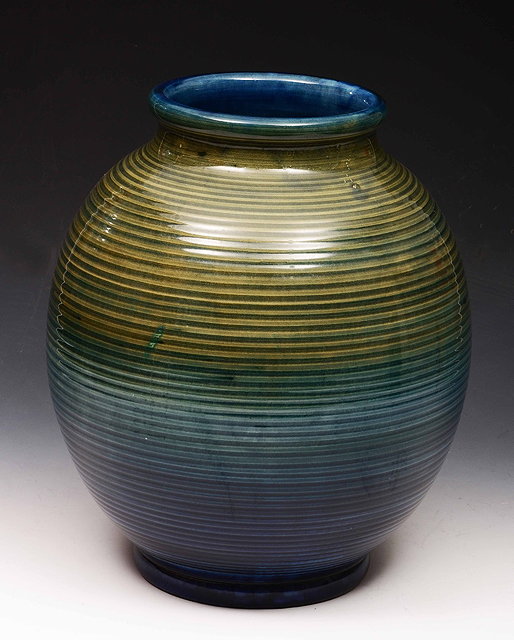 Appraisal: William Moorcroft British - Ribbed vase stamped 'Potter to HM