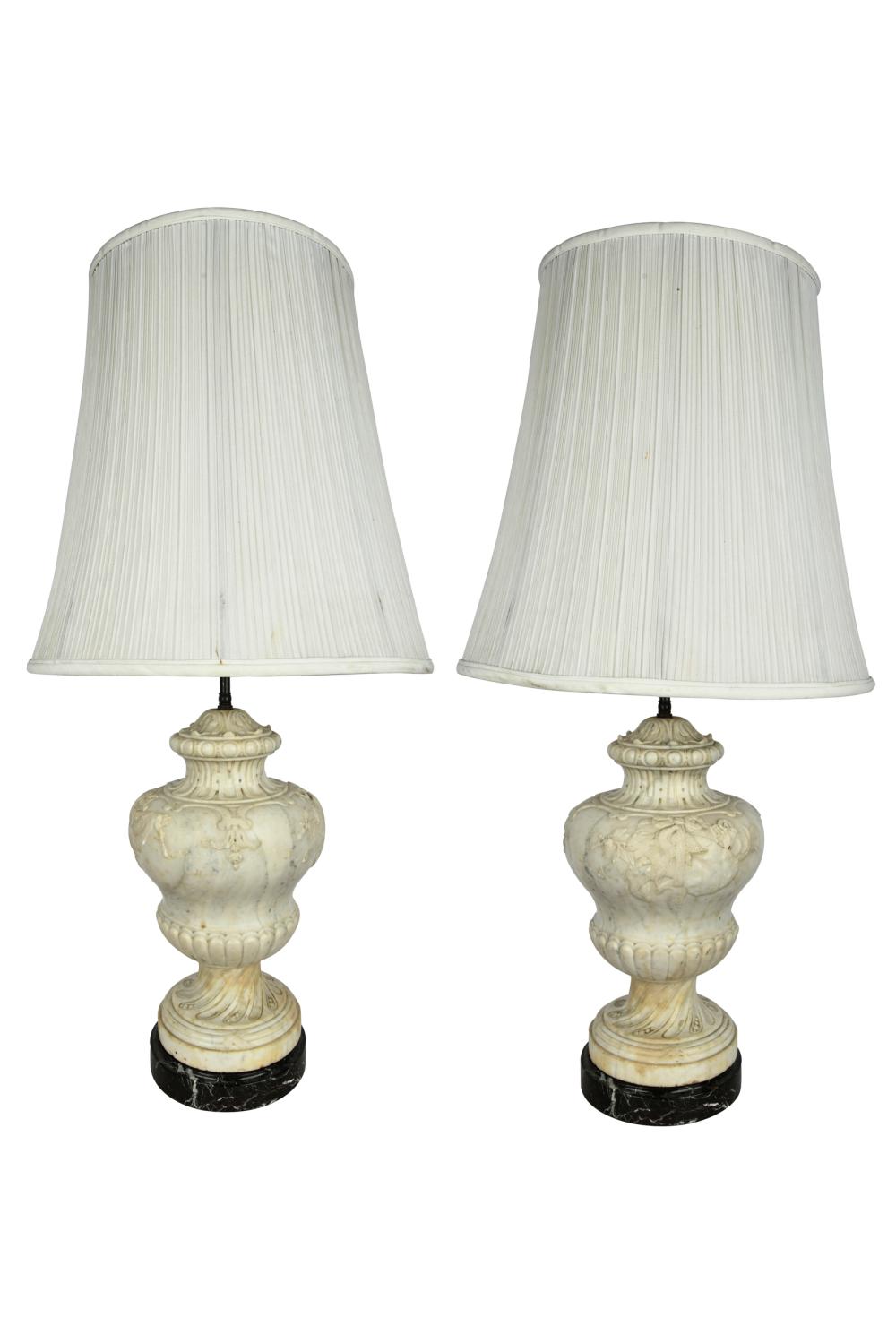 Appraisal: PAIR OF MARBLE URNSeach mounted as a lamp resting on