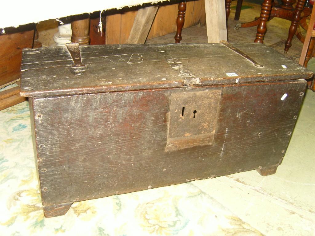 Appraisal: A Georgian oak box with iron lock and bindings