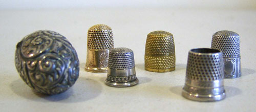 Appraisal: Three silver thimbles together with an acorn shaped case and