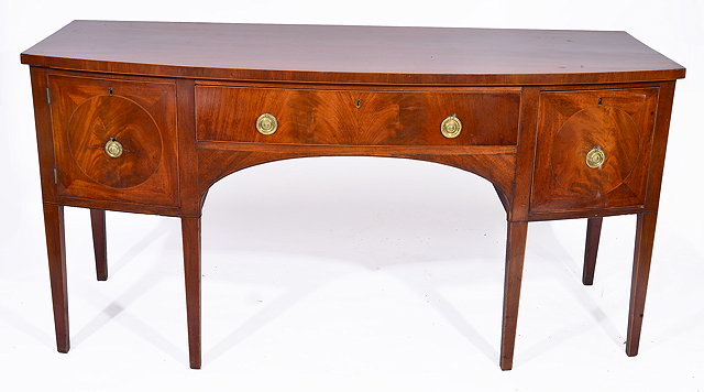 Appraisal: A GEORGE III MAHOGANY BOW FRONTED DINING ROOM SIDEBOARD with