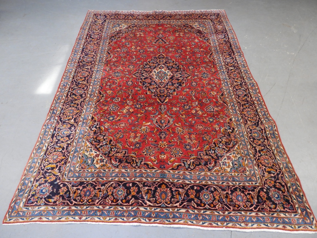 Appraisal: ANTIQUE KESHAN RUG Middle EastEarly th CenturyNavy blue yellow red