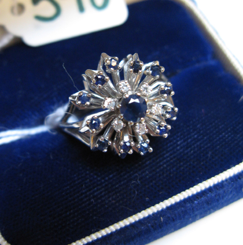 Appraisal: SAPPHIRE DIAMOND AND FOURTEEN KARAT WHITE GOLD CLUSTER RING set