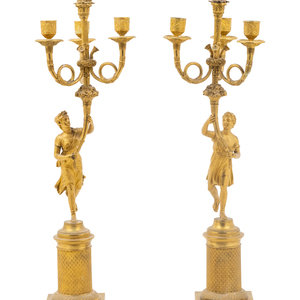 Appraisal: A Pair of French Gilt Bronze Figural Three-Light Candelabra th