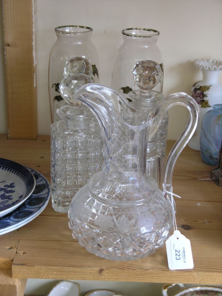 Appraisal: A cut glass jug engraved with grapes and vine leaves