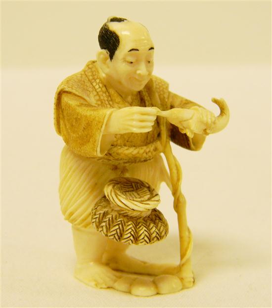 Appraisal: Netsuke Japanese early th C carved ivory figure of man