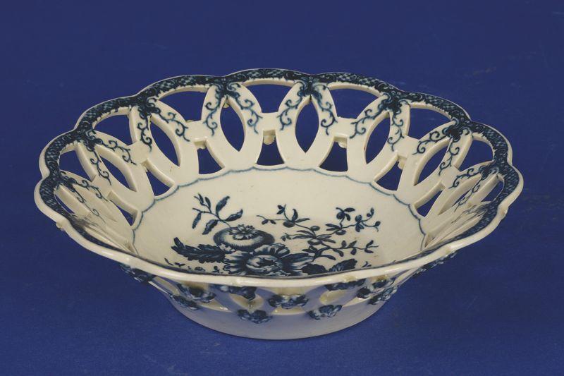 Appraisal: A FIRST PERIOD WORCESTER BLUE AND WHITE PIERCED BASKET circa